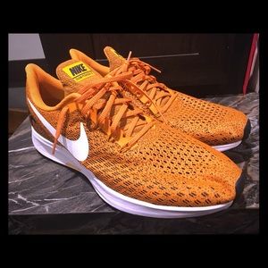 Go VOLS ! Orange and white Nike Air Pegasus 35's.